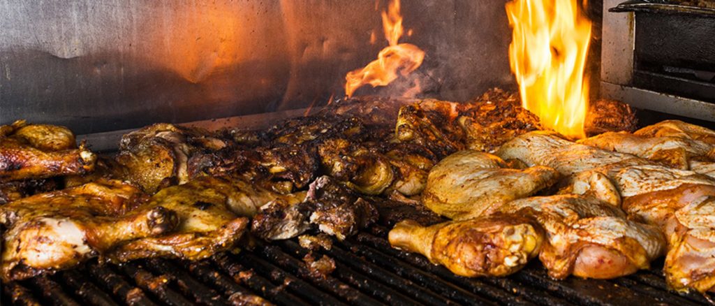 You have got to try out Peppa's Jerk Chicken's $10 chicken meal. Photo courtesy of Tasting Table.
